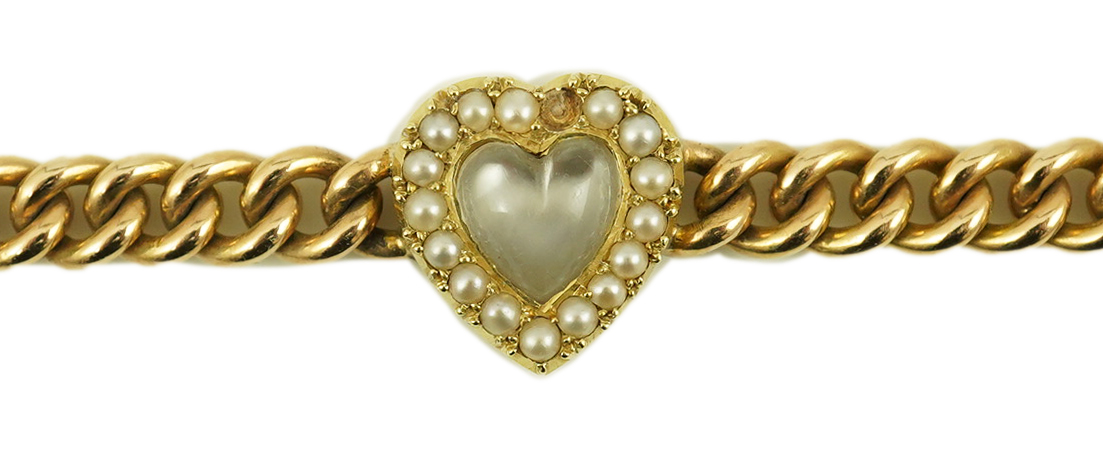 A late Victorian 15ct gold curb link bracelet, with central moonstone and seed pearl set heart shaped motif